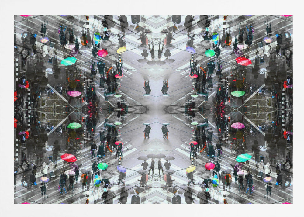 A symmetrical, kaleidoscopic abstract artwork created from an aerial view of a rainy city intersection. The mostly black and white image features pops of vibrant color from numerous umbrellas held by pedestrians crossing the street, all framed in a textured silver border. Artwork