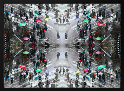 A symmetrical, kaleidoscopic abstract artwork created from an aerial view of a rainy city intersection. The mostly black and white image features pops of vibrant color from numerous umbrellas held by pedestrians crossing the street, all framed in a textured silver border. Artwork