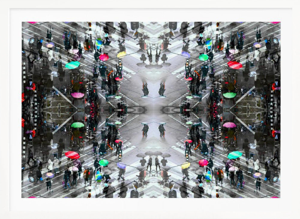 A symmetrical, kaleidoscopic abstract artwork created from an aerial view of a rainy city intersection. The mostly black and white image features pops of vibrant color from numerous umbrellas held by pedestrians crossing the street, all framed in a textured silver border. Artwork