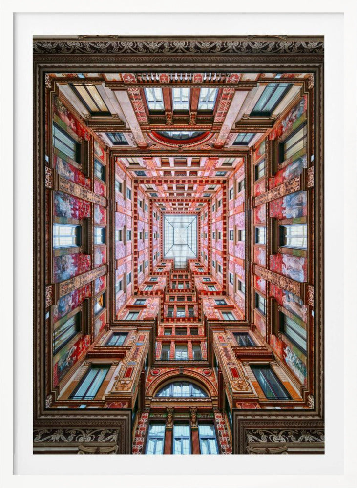 A symmetrical, worm's-eye view looking up through the center of an ornate, multi-story courtyard. The red and gold walls are covered in intricate details and frescoes, receding into the distance towards a square glass skylight. The entire artwork is presented within a decorative dark brown frame. Artwork