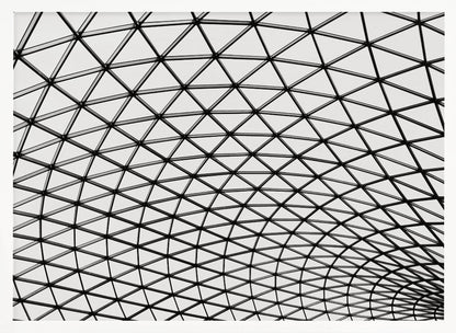 A framed, black and white photograph of a modern architectural dome ceiling. The image is a close-up, looking up at the intricate metal framework that creates a repeating pattern of triangles against the bright glass panels. Poster