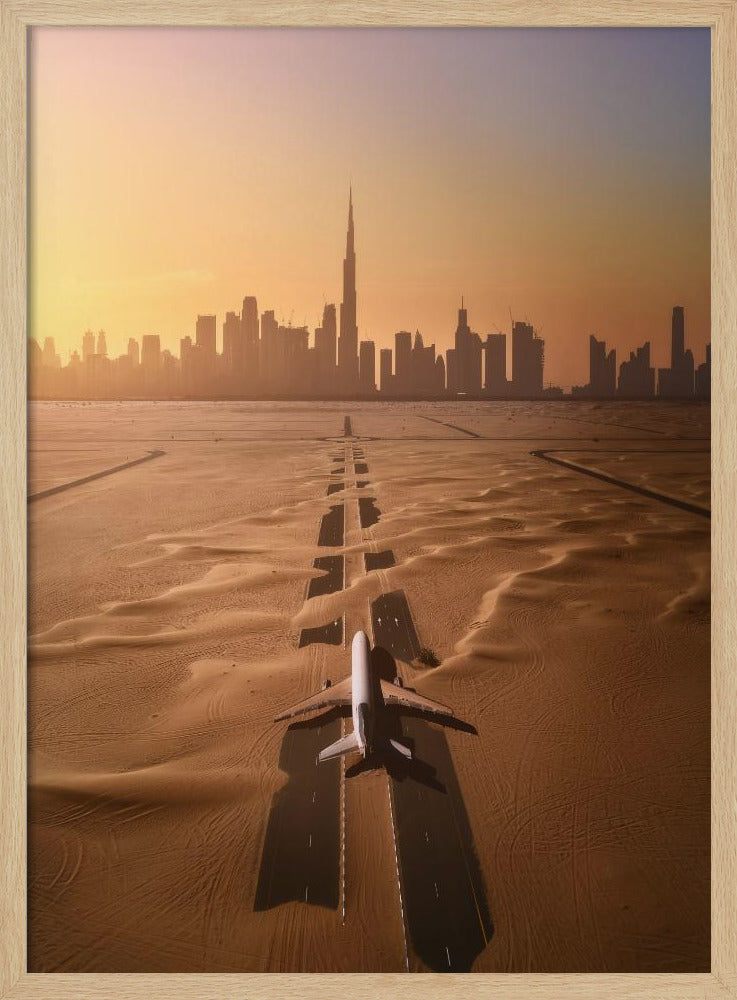 A surreal high-angle view of a white airplane on a runway partially buried in desert sand, pointing towards the Dubai city skyline during a hazy orange sunset. Decor