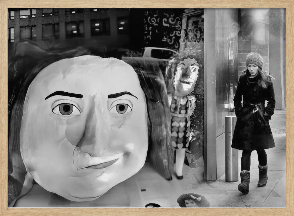 A surreal black and white photograph with a silver frame, featuring a giant, cartoonish head of a historical figure reflected in a window, juxtaposed with a young woman in a winter coat and beanie walking down a city sidewalk. Wall Art