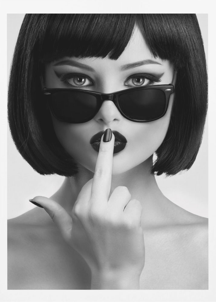 A striking black and white portrait of a woman with a sharp bob haircut, sunglasses, and bold makeup. She holds one finger with a black-painted nail up to her dark lips, making a 'shushing' gesture. Poster