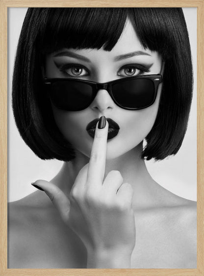A striking black and white portrait of a woman with a sharp bob haircut, sunglasses, and bold makeup. She holds one finger with a black-painted nail up to her dark lips, making a 'shushing' gesture. Poster