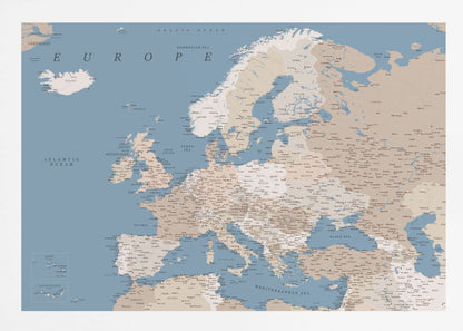 A detailed, framed map of Europe with a muted color palette. The oceans and seas are a soft blue, while the countries are various shades of beige and tan. Text labels for countries, cities, and bodies of water are clearly visible across the map. The map is housed in a simple silver-gray frame. Poster
