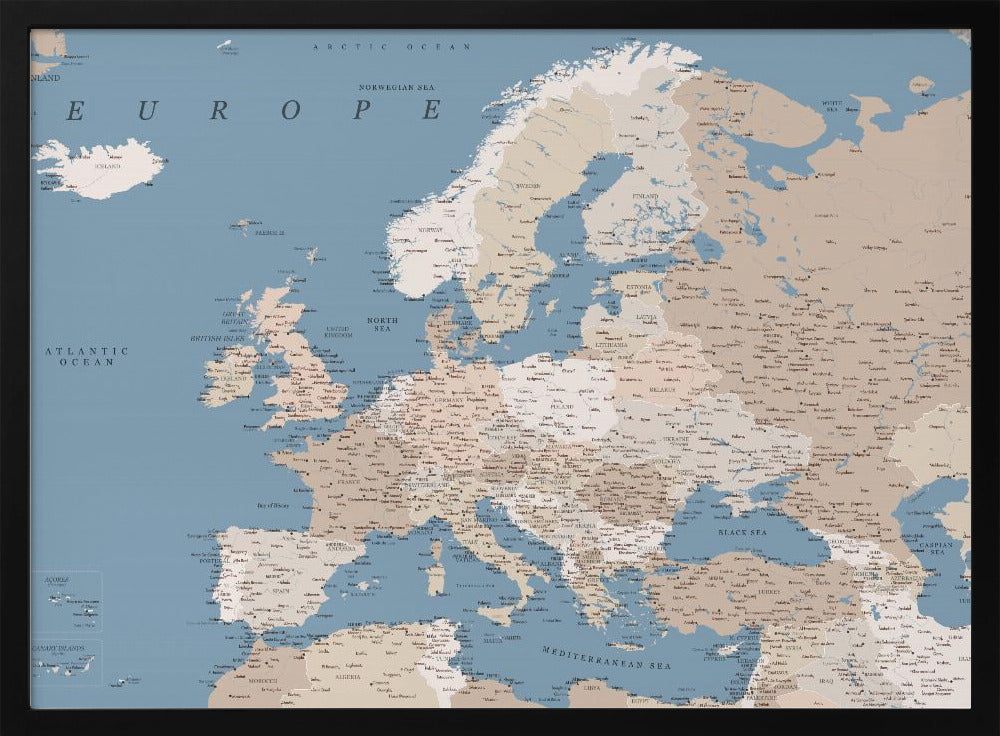 A detailed, framed map of Europe with a muted color palette. The oceans and seas are a soft blue, while the countries are various shades of beige and tan. Text labels for countries, cities, and bodies of water are clearly visible across the map. The map is housed in a simple silver-gray frame. Poster