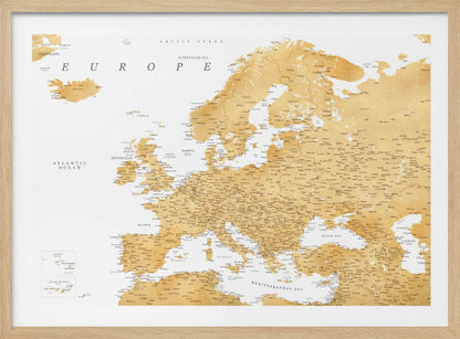 A framed map of Europe featuring golden landmasses on a crisp white background. The map includes country names, major cities, and bodies of water, all presented in a clean, modern font. The artwork is enclosed in a simple, light gray frame. Print