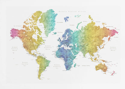 A colorful world map with a watercolor texture, framed in a light gray frame. The continents are shaded with a rainbow gradient, transitioning from pink and orange on the left to yellow, green, and blue in the center, and back to yellow and orange on the right. The oceans are white, and the map features geographical labels in Spanish. Wall Art
