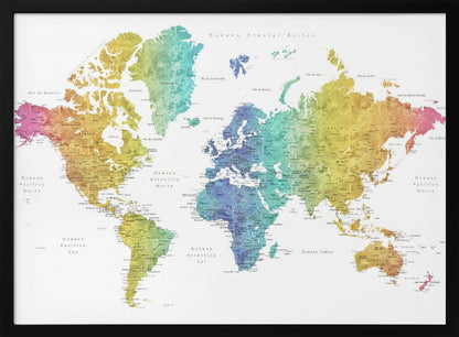 A colorful world map with a watercolor texture, framed in a light gray frame. The continents are shaded with a rainbow gradient, transitioning from pink and orange on the left to yellow, green, and blue in the center, and back to yellow and orange on the right. The oceans are white, and the map features geographical labels in Spanish. Wall Art