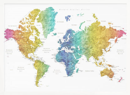 A colorful world map with a watercolor texture, framed in a light gray frame. The continents are shaded with a rainbow gradient, transitioning from pink and orange on the left to yellow, green, and blue in the center, and back to yellow and orange on the right. The oceans are white, and the map features geographical labels in Spanish. Wall Art