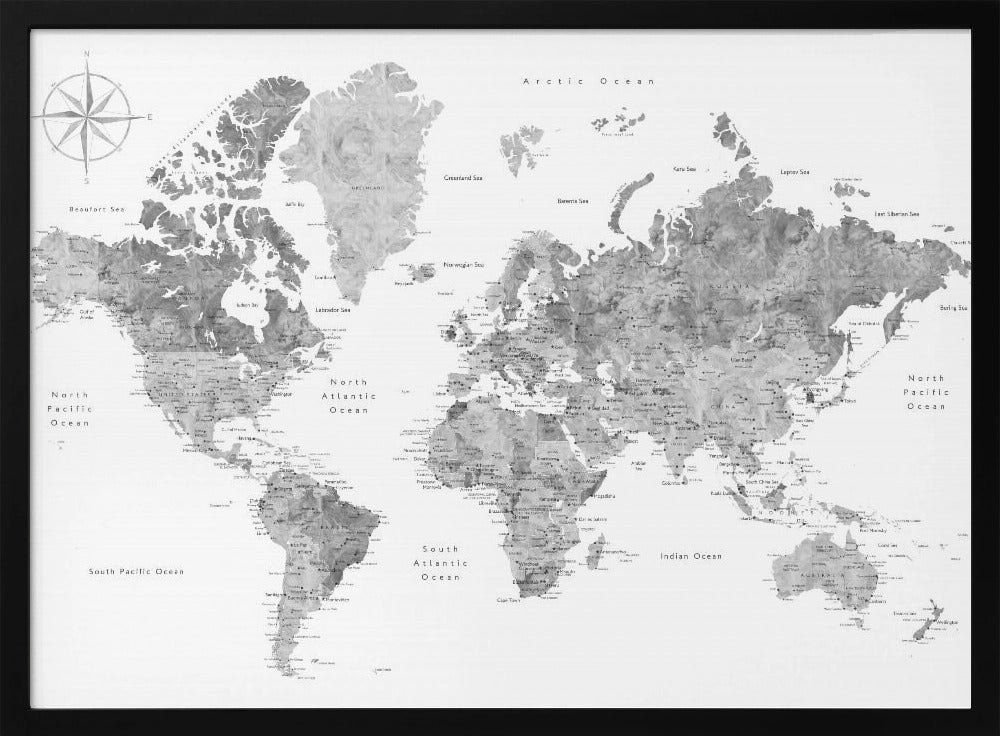 A framed, modern world map presented in a monochrome palette of black, white, and various shades of gray. The landmasses feature a detailed, textured design, set against a clean white background for the oceans. A compass rose is visible in the top left corner. The map is enclosed within a simple, light gray frame. Poster