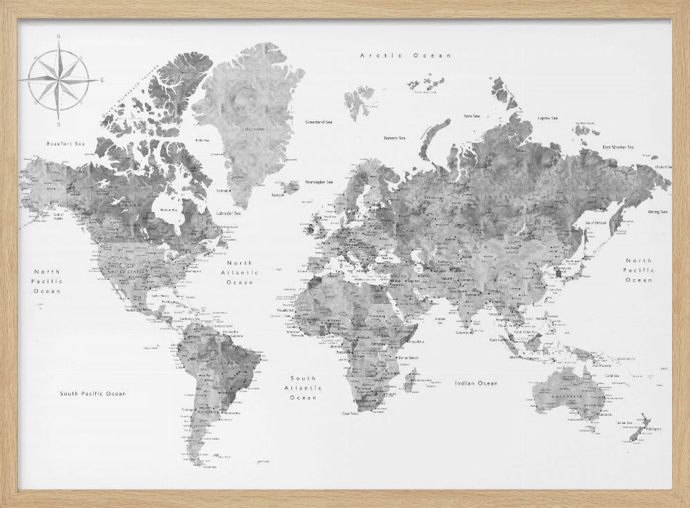 A framed, modern world map presented in a monochrome palette of black, white, and various shades of gray. The landmasses feature a detailed, textured design, set against a clean white background for the oceans. A compass rose is visible in the top left corner. The map is enclosed within a simple, light gray frame. Poster