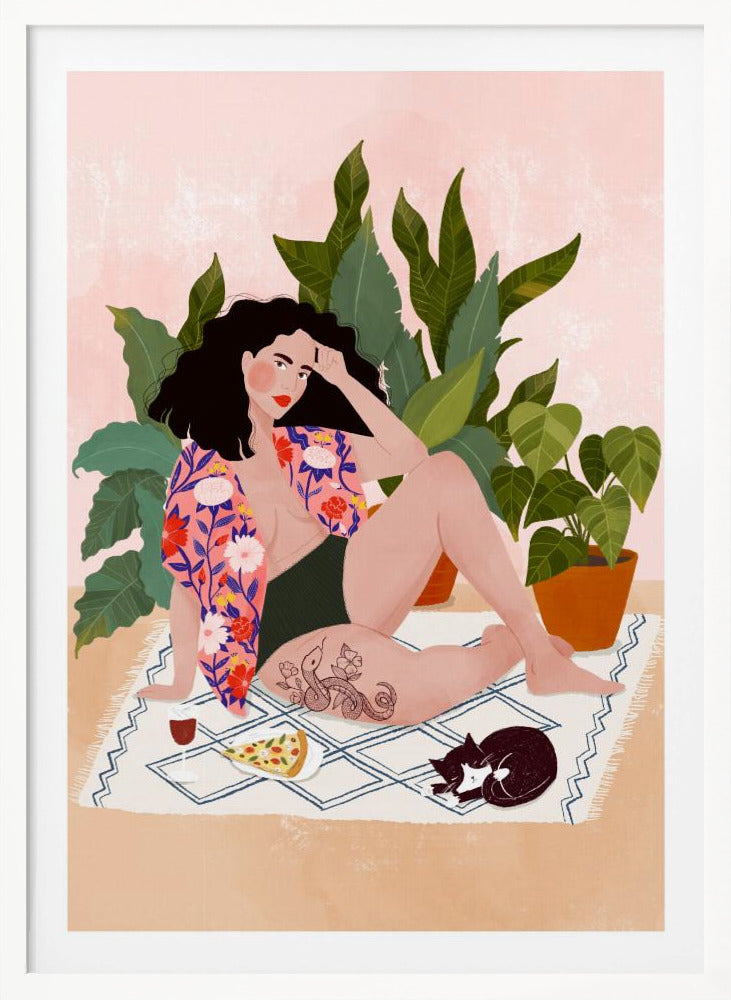 An illustration of a woman with dark curly hair relaxing on a patterned blanket indoors. She is wearing a green swimsuit and a pink floral shirt, with a prominent snake tattoo on her thigh. Next to her is a slice of pizza, a glass of red wine, and a sleeping black and white cat, all set against a backdrop of large green houseplants and a pink wall. Artwork