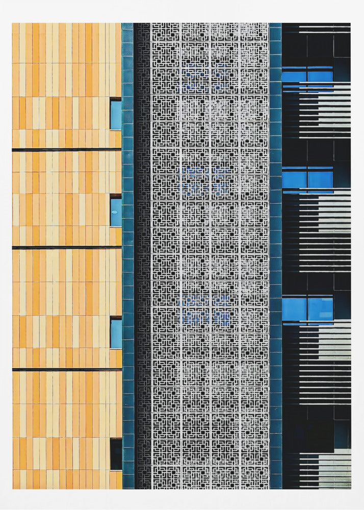 A vertical abstract architectural photograph showcasing the facade of a modern building, featuring a contrast of textures and colors: warm yellow vertical tiles on the left, an intricate white geometric screen in the center, and a dark section with vibrant blue windows on the right. Print