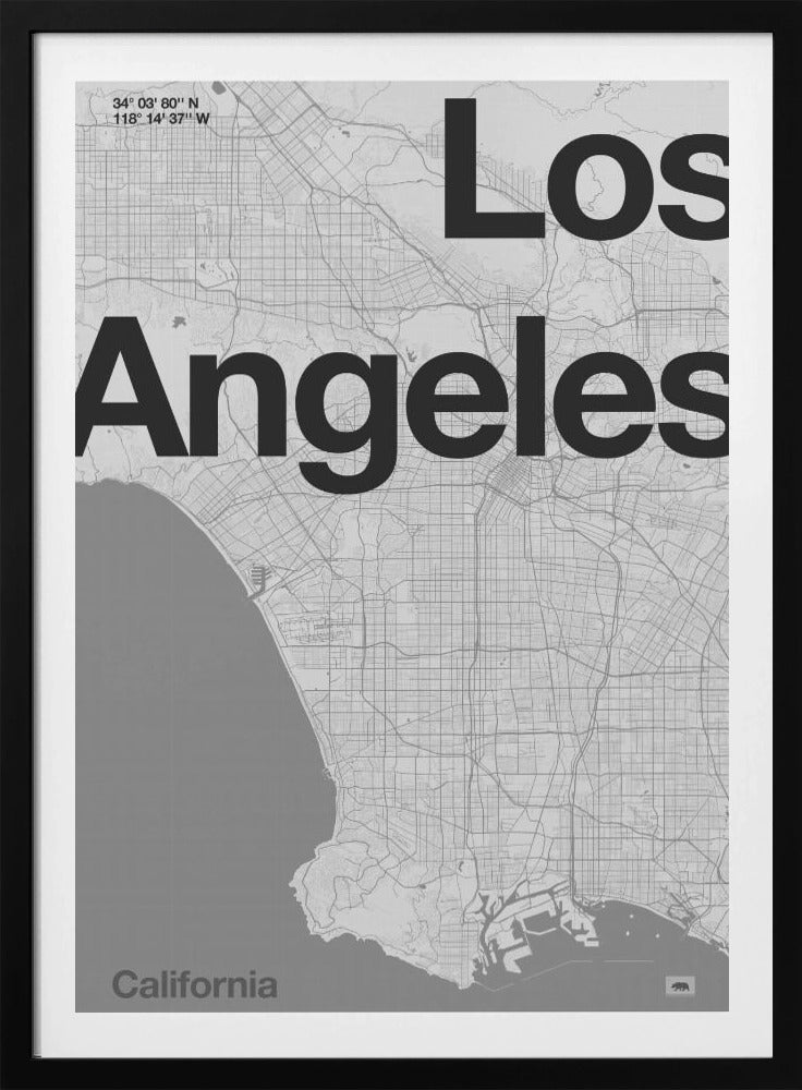 A minimalist black and white framed map of Los Angeles. The poster features a detailed street grid of the city and its coastline. The words 'Los Angeles' are overlaid in a large, bold, black sans-serif font. In the top-left corner are the coordinates, and in the bottom-left is the word 'California'. Decor