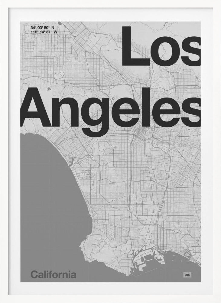 A minimalist black and white framed map of Los Angeles. The poster features a detailed street grid of the city and its coastline. The words 'Los Angeles' are overlaid in a large, bold, black sans-serif font. In the top-left corner are the coordinates, and in the bottom-left is the word 'California'. Decor