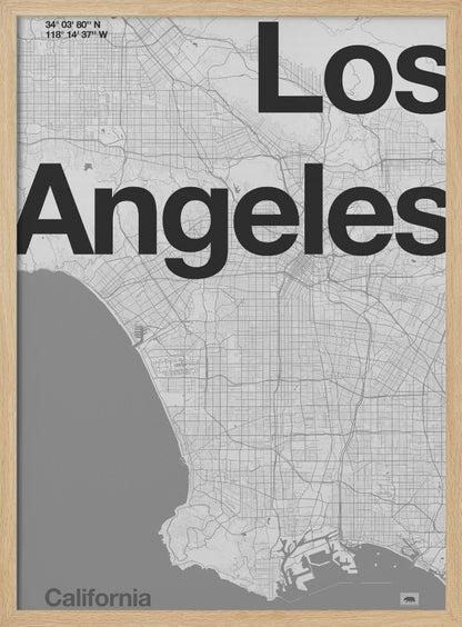 A minimalist black and white framed map of Los Angeles. The poster features a detailed street grid of the city and its coastline. The words 'Los Angeles' are overlaid in a large, bold, black sans-serif font. In the top-left corner are the coordinates, and in the bottom-left is the word 'California'. Decor