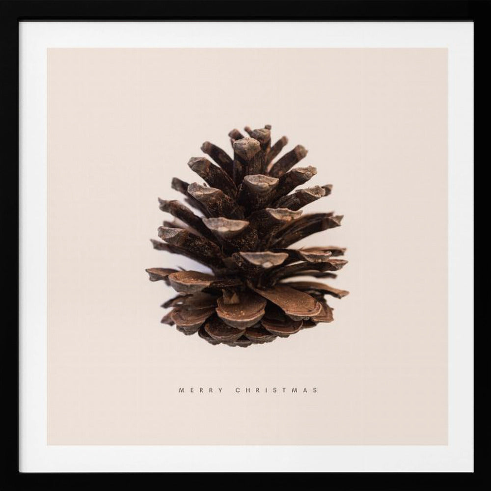 A minimalist art print featuring a single brown pinecone centered on an off-white background. The words 'MERRY CHRISTMAS' are printed in a simple, spaced-out font below the pinecone. The entire image is enclosed in a light wood frame. Artwork