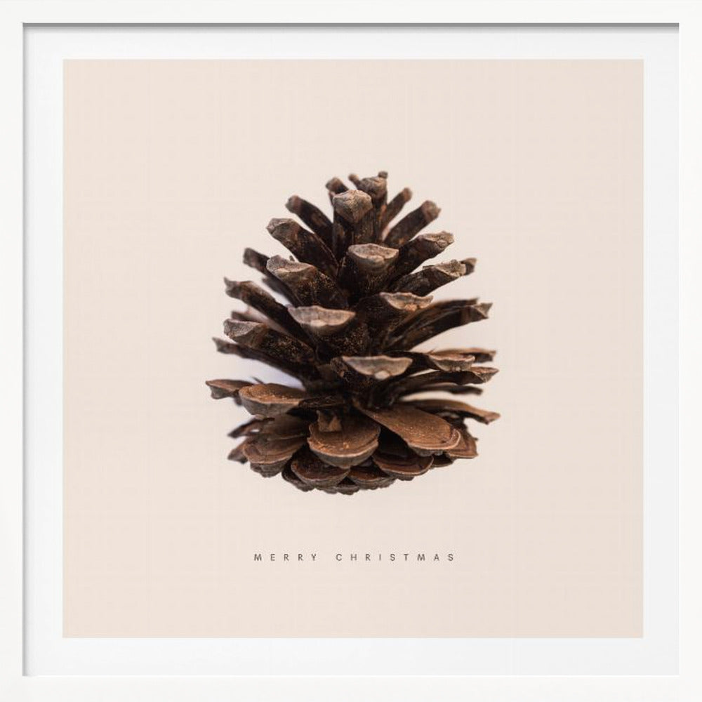 A minimalist art print featuring a single brown pinecone centered on an off-white background. The words 'MERRY CHRISTMAS' are printed in a simple, spaced-out font below the pinecone. The entire image is enclosed in a light wood frame. Artwork