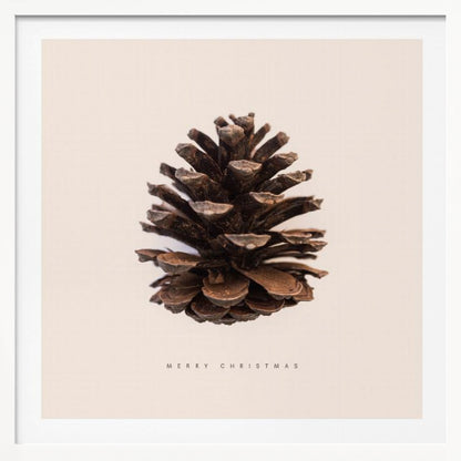 A minimalist art print featuring a single brown pinecone centered on an off-white background. The words 'MERRY CHRISTMAS' are printed in a simple, spaced-out font below the pinecone. The entire image is enclosed in a light wood frame. Artwork
