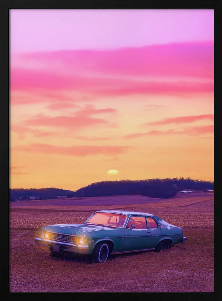 A vintage green muscle car is parked in a purple-hued field under a vibrant sunset sky that blends from orange to a vivid pink. The car's headlights are glowing, and the sun is setting behind distant hills, creating a dreamy, retro atmosphere. Decor