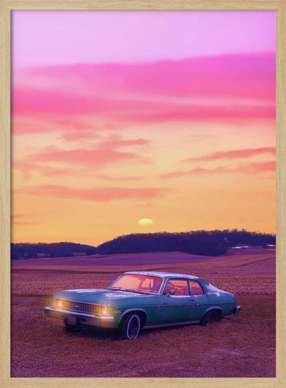 A vintage green muscle car is parked in a purple-hued field under a vibrant sunset sky that blends from orange to a vivid pink. The car's headlights are glowing, and the sun is setting behind distant hills, creating a dreamy, retro atmosphere. Decor