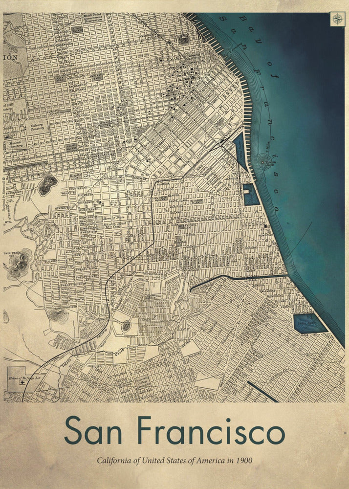 A framed vintage map of San Francisco from 1900. The map is detailed on aged, beige paper, with the bay depicted in a deep teal blue. Below the map, text reads 'San Francisco' and 'California of United States of America in 1900'. Artwork