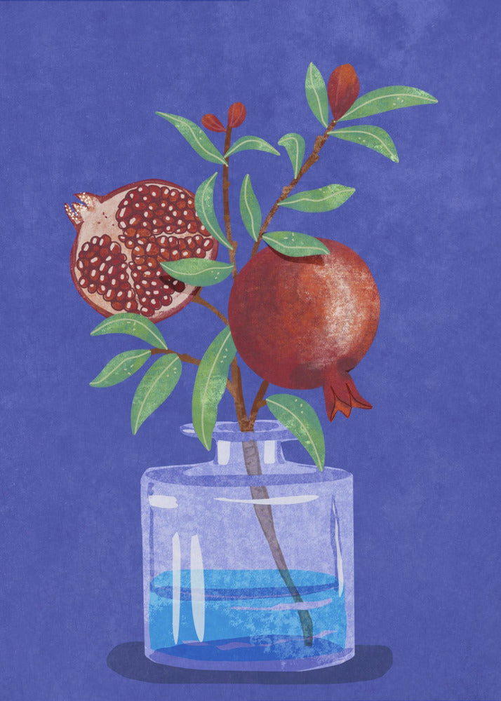 A vibrant illustration of a pomegranate branch in a clear glass vase against a deep blue, textured background. The branch features bright green leaves, a whole red pomegranate, and another cut in half to show its seeds. Decor