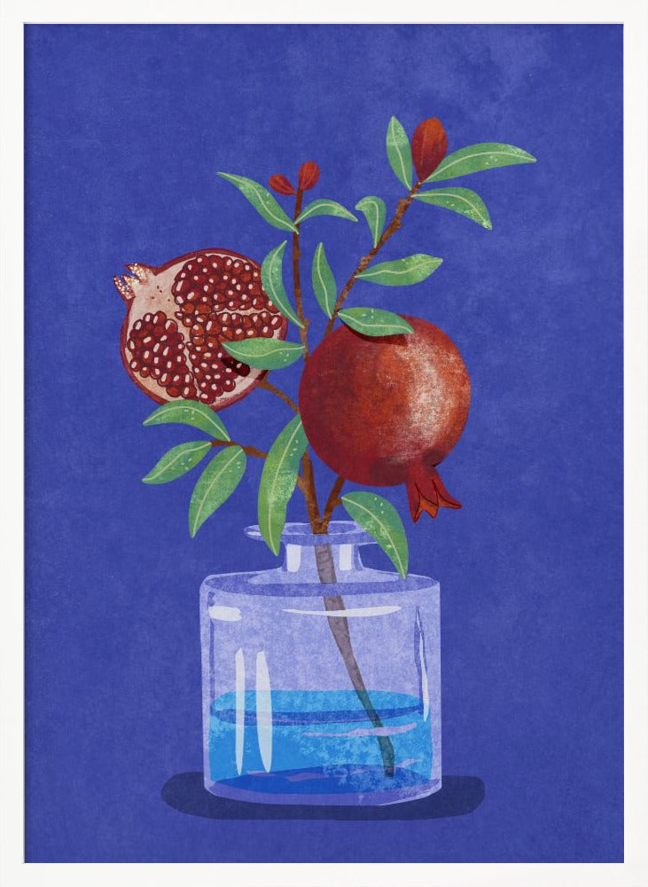 A vibrant illustration of a pomegranate branch in a clear glass vase against a deep blue, textured background. The branch features bright green leaves, a whole red pomegranate, and another cut in half to show its seeds. Decor