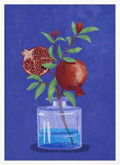 A vibrant illustration of a pomegranate branch in a clear glass vase against a deep blue, textured background. The branch features bright green leaves, a whole red pomegranate, and another cut in half to show its seeds. Decor