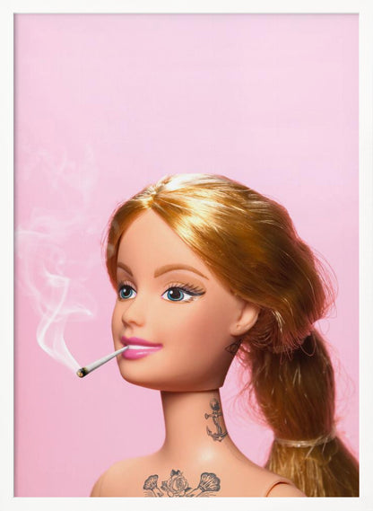 A close-up photograph of a blonde doll, resembling Barbie, with tattoos on her neck and chest, smoking a joint against a solid pink background. Smoke curls upwards from the lit cigarette in her pink-lipsticked mouth. Artwork