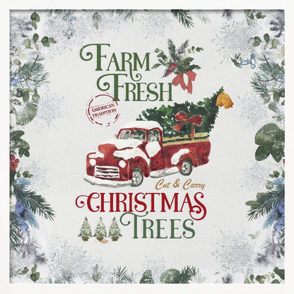 A vintage-style Christmas art print in a light wood frame. It features a watercolor illustration of a classic red pickup truck carrying a Christmas tree, with snow on its hood and roof. The text reads 'Farm Fresh Cut & Carry Christmas Trees' in festive green and red fonts. The background is white with a decorative border of frosted greenery and snowflakes. Wall Art