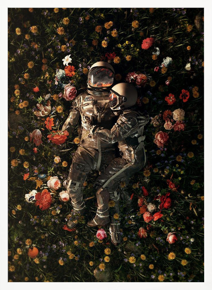 An overhead view of two astronauts in full gear, embracing each other while lying down in a lush, dark field filled with a vibrant array of colorful flowers. Wall Art