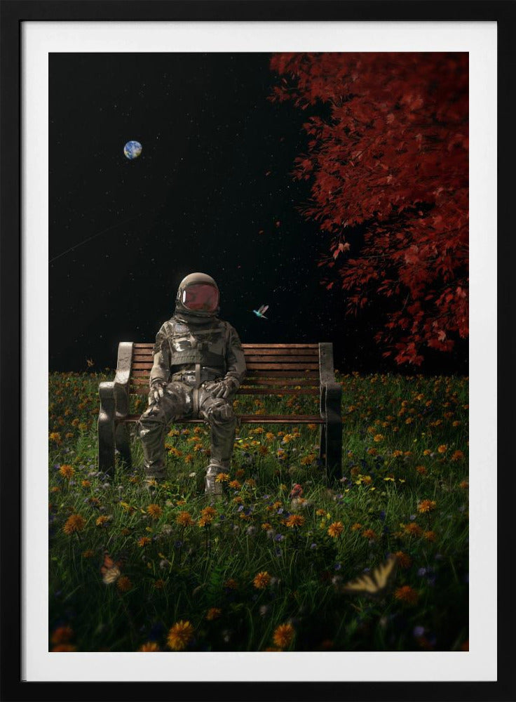 A surreal scene depicting an astronaut in a full spacesuit sitting alone on a wooden park bench in a vibrant field of wildflowers under a starry night sky. The planet Earth is visible in the distance, and a large tree with red leaves frames the right side of the image. Poster