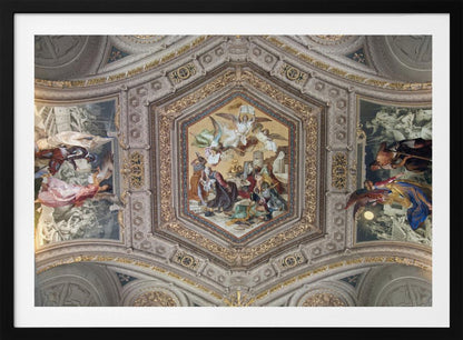 A detailed photograph of an ornate, coffered ceiling from the Renaissance period. The ceiling has intricate grey and gold architectural details, with a central hexagonal fresco and smaller side paintings depicting religious scenes with angels and figures in classical robes, all enclosed in a silver frame. Artwork