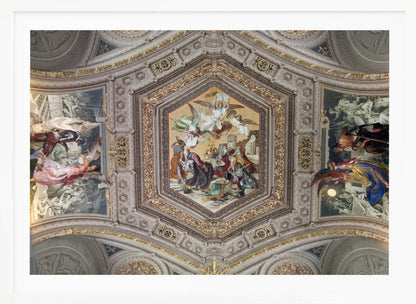 A detailed photograph of an ornate, coffered ceiling from the Renaissance period. The ceiling has intricate grey and gold architectural details, with a central hexagonal fresco and smaller side paintings depicting religious scenes with angels and figures in classical robes, all enclosed in a silver frame. Artwork