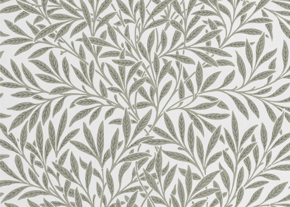 A framed art print displaying a dense pattern of sage green leaves and branches on a white background. The design is continuous and has a calm, naturalistic feel, enclosed within a simple silver frame. Artwork
