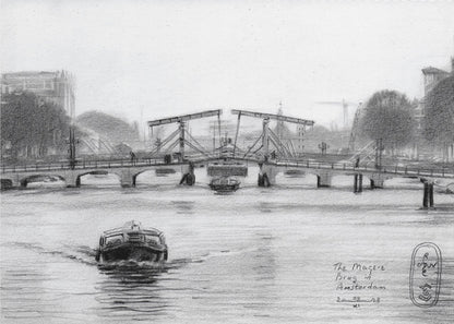 A framed black and white pencil drawing of the Magere Brug, a famous bridge in Amsterdam. The drawbridge is depicted over a canal with a boat in the foreground, creating a classic European city scene. Wall Art