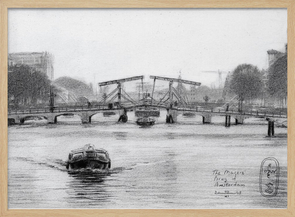 A framed black and white pencil drawing of the Magere Brug, a famous bridge in Amsterdam. The drawbridge is depicted over a canal with a boat in the foreground, creating a classic European city scene. Wall Art