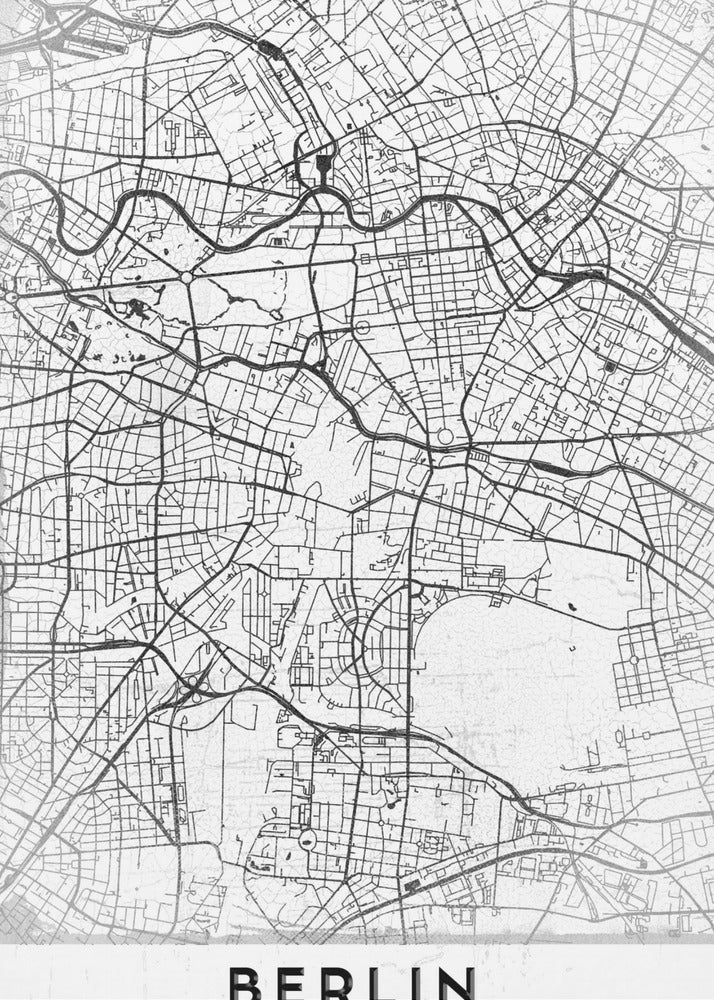 A minimalist black and white poster of a street map of Berlin, Germany. The map's intricate network of roads and waterways is depicted with black lines on a white, slightly textured background. The artwork is enclosed in a simple black frame, with the word 'BERLIN' printed in bold, black capital letters at the bottom center. Wall Art