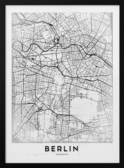 A minimalist black and white poster of a street map of Berlin, Germany. The map's intricate network of roads and waterways is depicted with black lines on a white, slightly textured background. The artwork is enclosed in a simple black frame, with the word 'BERLIN' printed in bold, black capital letters at the bottom center. Wall Art