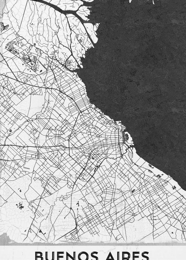 A minimalist black and white map of Buenos Aires, presented as a poster in a black frame. The city's roads and geography are detailed in black lines on a white background, while the adjacent body of water is solid black. The text 'BUENOS AIRES' is displayed at the bottom. Wall Art
