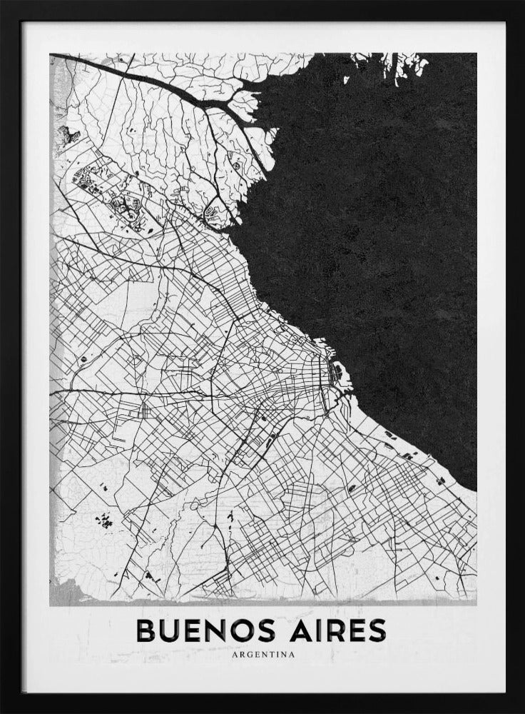 A minimalist black and white map of Buenos Aires, presented as a poster in a black frame. The city's roads and geography are detailed in black lines on a white background, while the adjacent body of water is solid black. The text 'BUENOS AIRES' is displayed at the bottom. Wall Art