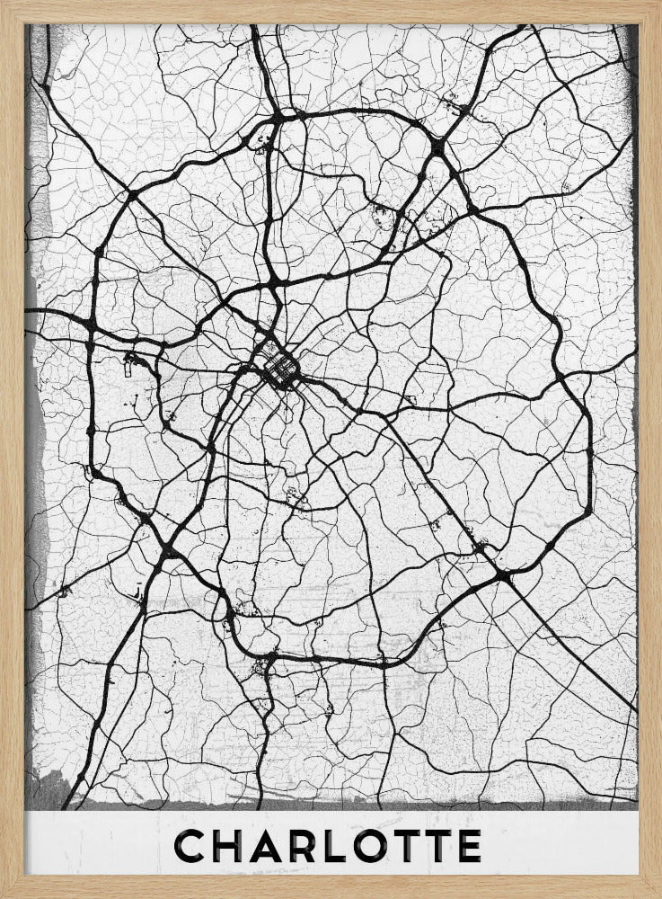 A minimalist black and white street map of Charlotte, North Carolina. The map highlights the major roads and highways as thick black lines on a distressed, crackled white background. The artwork is framed in black with the word 'CHARLOTTE' printed in bold capital letters at the bottom. Poster