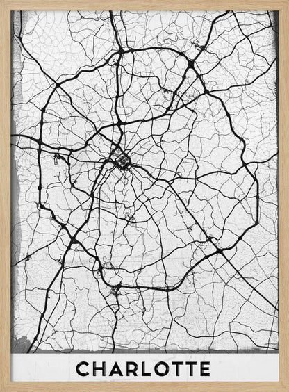 A minimalist black and white street map of Charlotte, North Carolina. The map highlights the major roads and highways as thick black lines on a distressed, crackled white background. The artwork is framed in black with the word 'CHARLOTTE' printed in bold capital letters at the bottom. Poster
