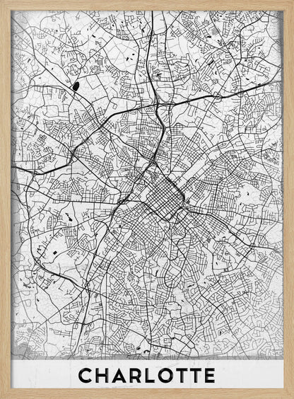 A minimalist black and white map of Charlotte, North Carolina, displayed in a black frame. The map details the intricate network of city streets and highways. At the bottom, a white banner features the city's name 'CHARLOTTE' in a bold, black, sans-serif font. Poster
