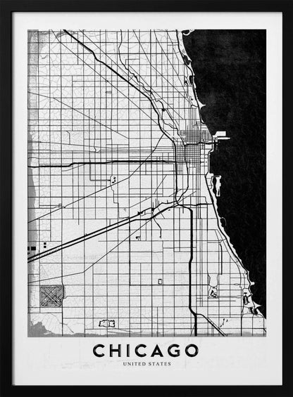 A minimalist black and white map of Chicago, featuring a grid street layout, major thoroughfares, and the shoreline of Lake Michigan. The map has a subtle crackled texture, is enclosed in a black frame, and has the word 'CHICAGO' in capital letters at the bottom. Decor