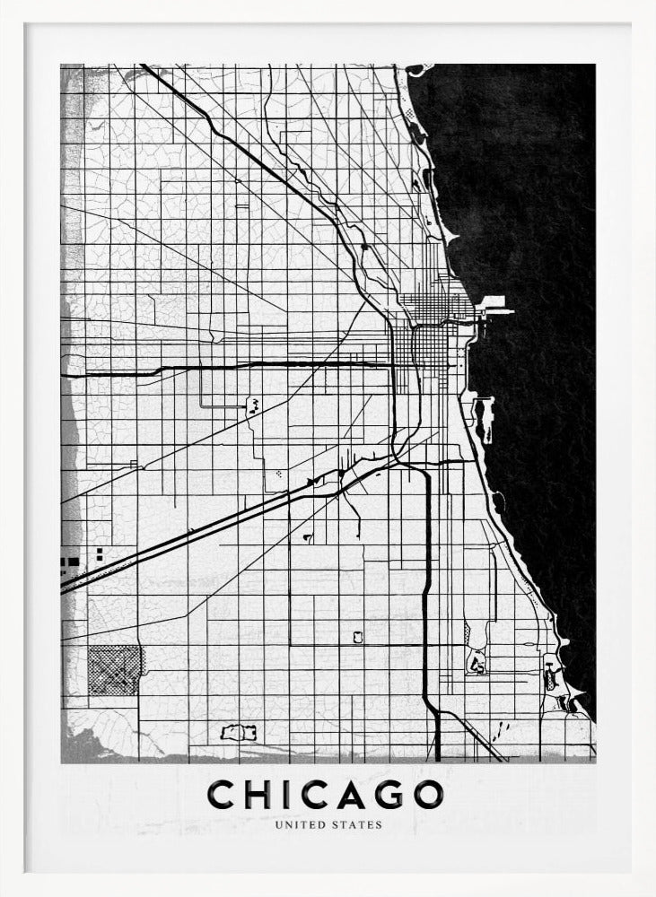 A minimalist black and white map of Chicago, featuring a grid street layout, major thoroughfares, and the shoreline of Lake Michigan. The map has a subtle crackled texture, is enclosed in a black frame, and has the word 'CHICAGO' in capital letters at the bottom. Decor