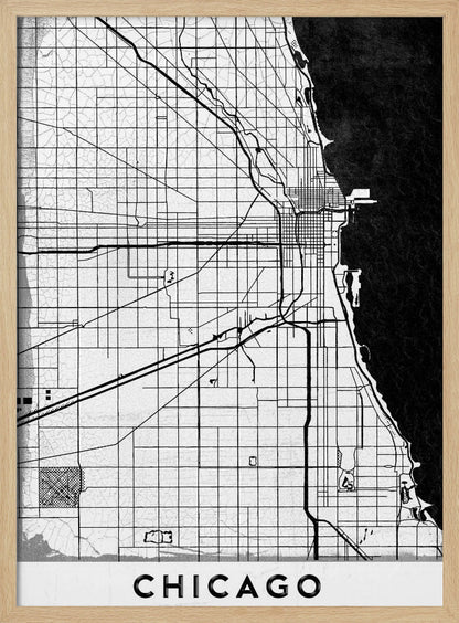 A minimalist black and white map of Chicago, featuring a grid street layout, major thoroughfares, and the shoreline of Lake Michigan. The map has a subtle crackled texture, is enclosed in a black frame, and has the word 'CHICAGO' in capital letters at the bottom. Decor